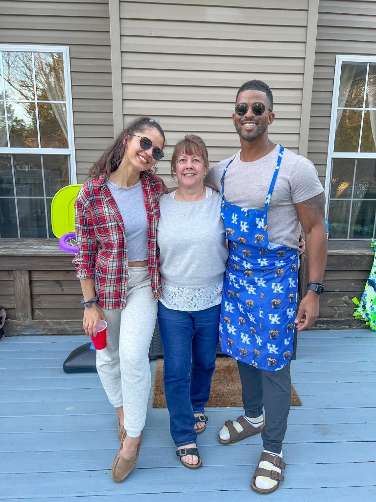 Janine Tate with her mother and husband